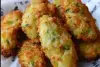 Foto ilustrativa de uma receita pronta de Bolinho de abobrinha, cenoura e batata