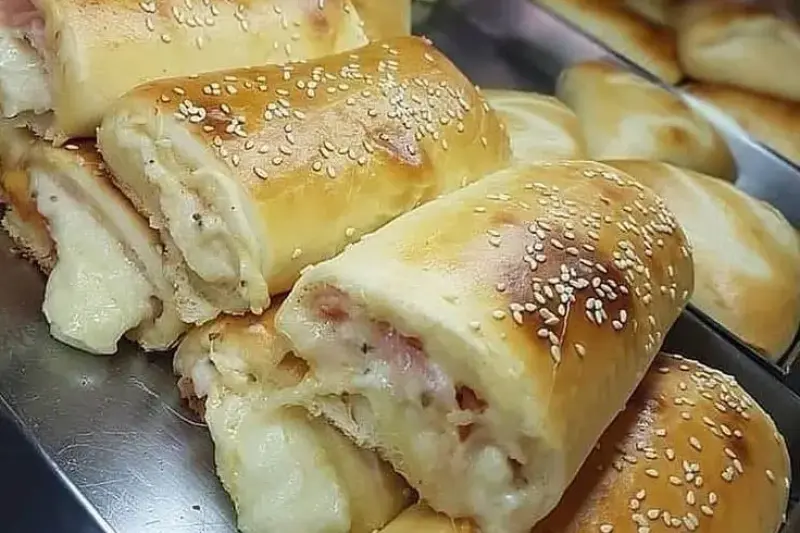 Foto ilustrativa da receita de Pãezinhos Pizza